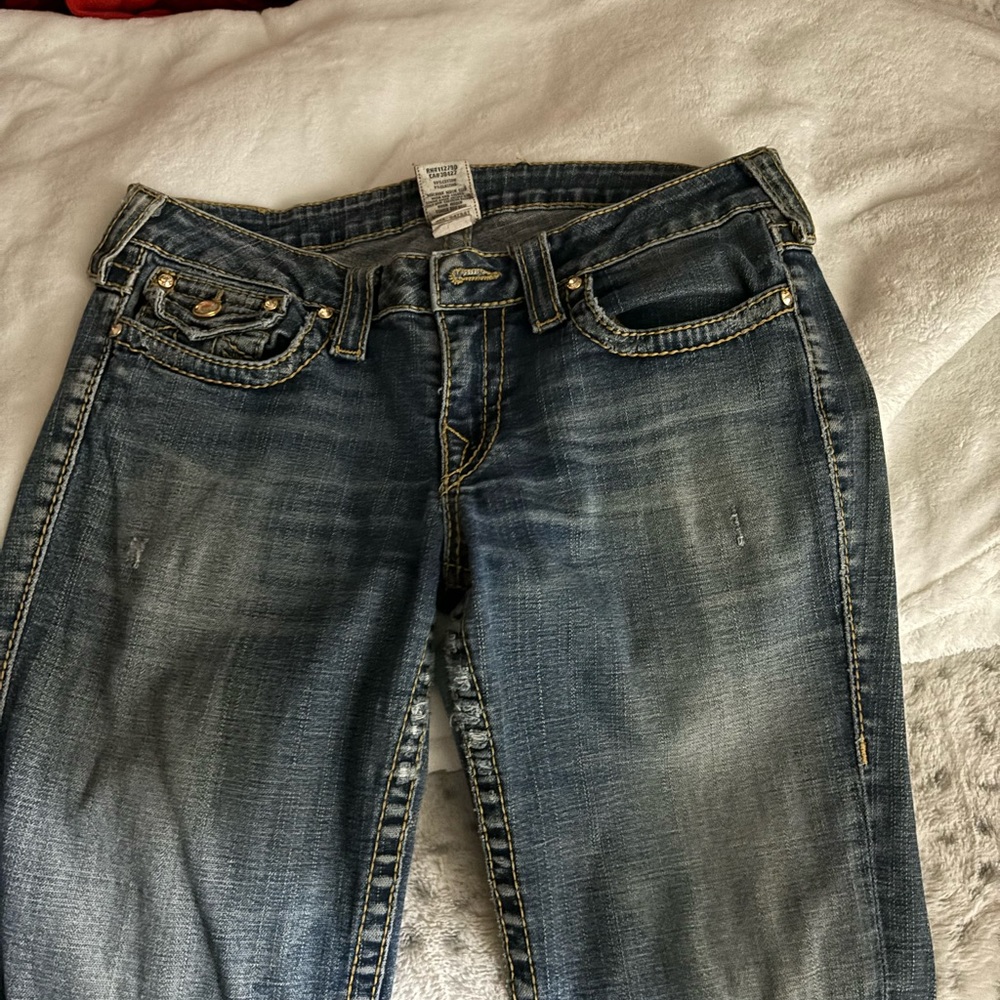 True Religion Jeans with gold stitching very cute and chic! Very cute also true.